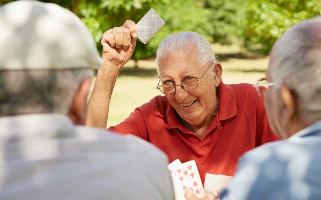 elderly playing cards