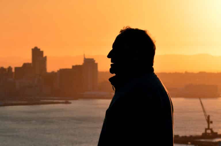 Silhouette of senior man at sunset