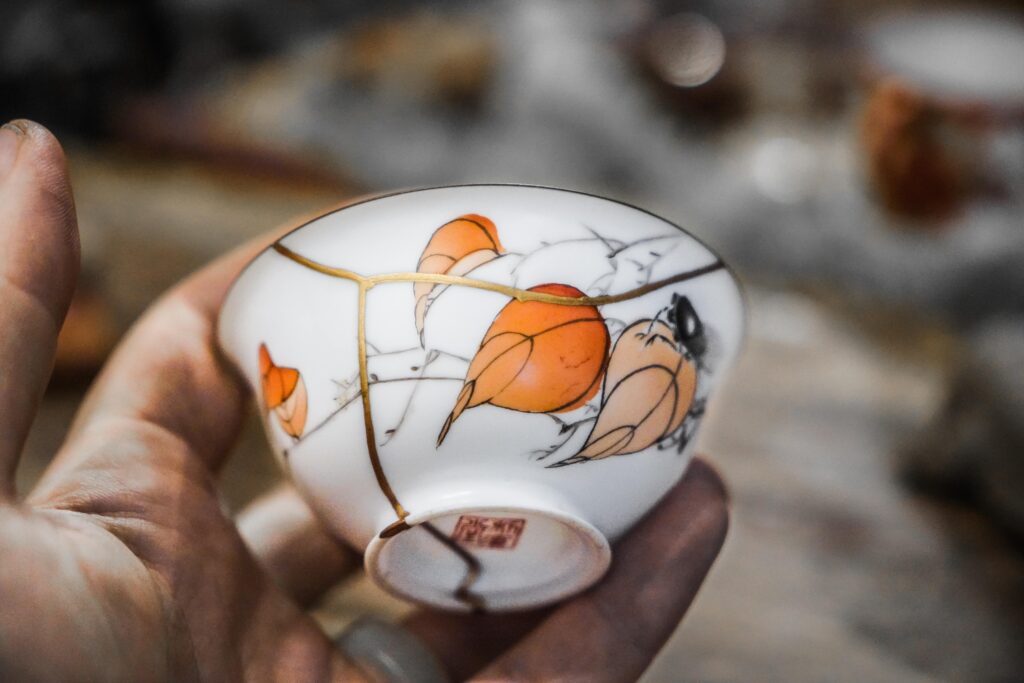 Porcelain cup repaired using kintsugi technique